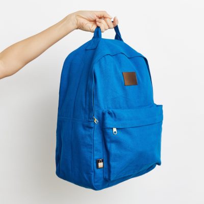 Custom made canvas Backpack for adult blue side view scaled from supreme creations us